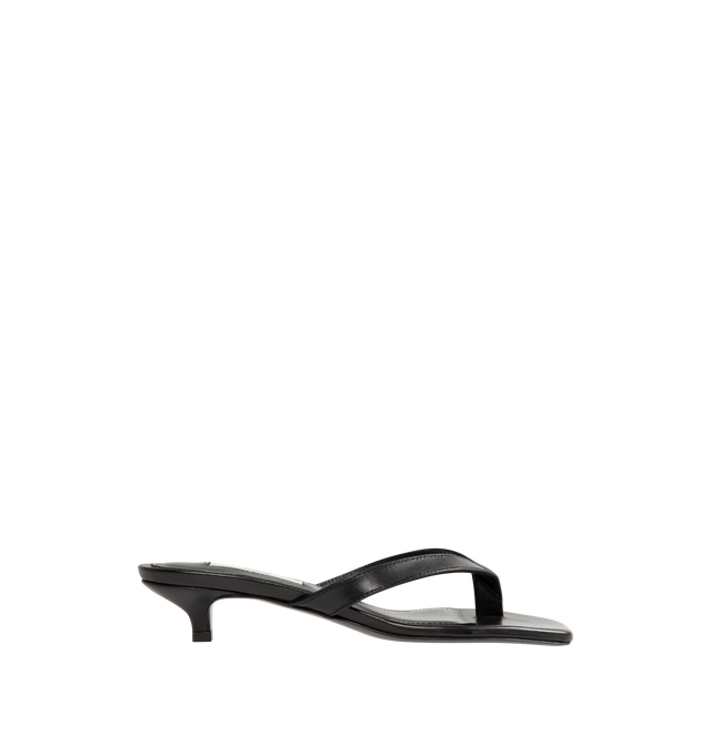 Image 1 of 4 - BLACK - Toteme Women's Leather Heeled Flip Flops are crafted in Italy from smooth, responsibly tanned leather and feature a minimalist thong silhouette with an open toe and easy slip-on construction. Set on a low 35mm heel, these designer sandals are finished with a leather lining and leather outsole, combining understated elegance with Toteme's signature minimalist aesthetic. Upper: Responsibly Tanned Leather. Lining: Leather. Outsole: Leather. Heel Height: 35 mm / 1.4 in. Made in Italy. 