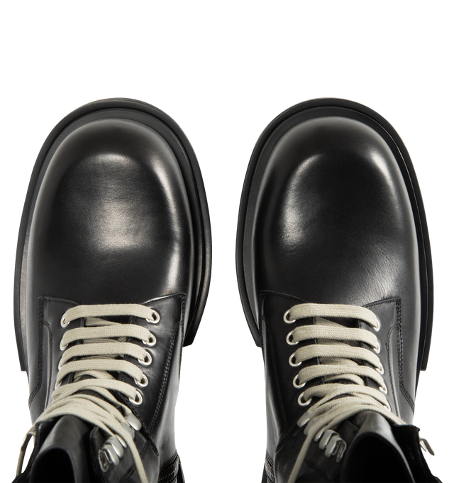 Image 4 of 4 - BLACK - RICK OWENS Low Army Gabe Boot featuring above-ankle height, front laces with eyelets on the foot and lacelets at the ankle, high geometric tongue, a stitched heel counter, long back pull tab, classic army sole and a low heel. 100% calf leather. 