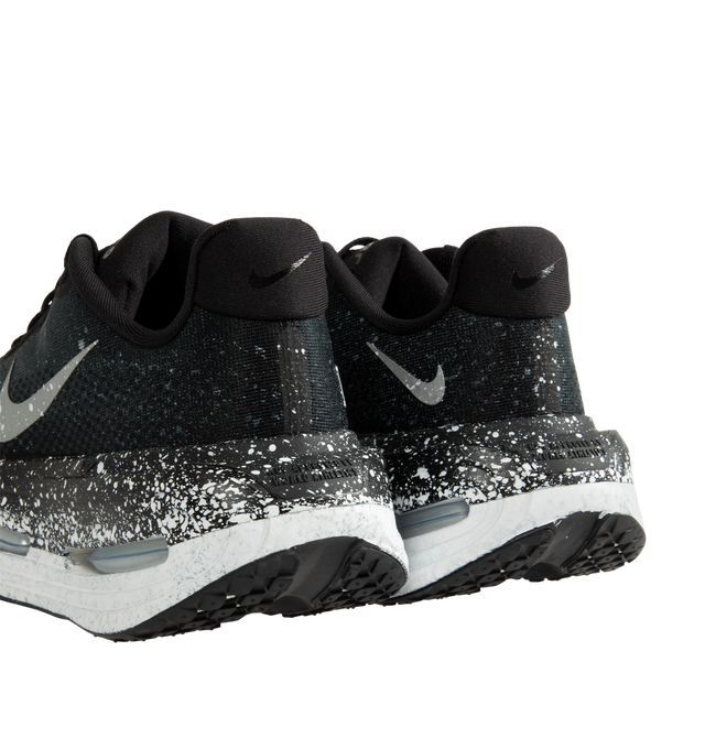 Image 3 of 5 - BLACK - Nike Women's Vomero Premium Running Shoes feature an engineered mesh upper for lightweight breathability and a secure fit. Designed for maximum cushioning, these performance running shoes combine a full-length ZoomX foam midsole with dual Air Zoom units at the forefoot and heel for exceptional comfort, responsive energy return, and a smooth ride. A durable Waffle rubber outsole provides reliable traction for everyday miles. Main Material: Mesh. Midsole: ZoomX Foam with Dual Air Zoom U 