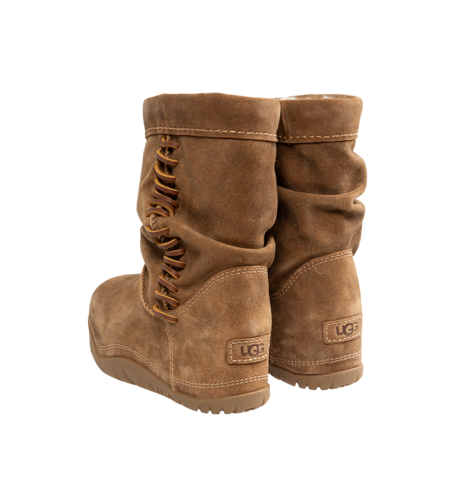 Image 3 of 4 - BROWN - UGG women's Bucked boot with a soft suede upper with an elevated, worn-in feel and a leather whipstitch detail, signature sheepskin lining and cushy rubber platform. Features sugarcane EVA midsole, molded rubber outsole and UGG Logo, heat-embossed. 