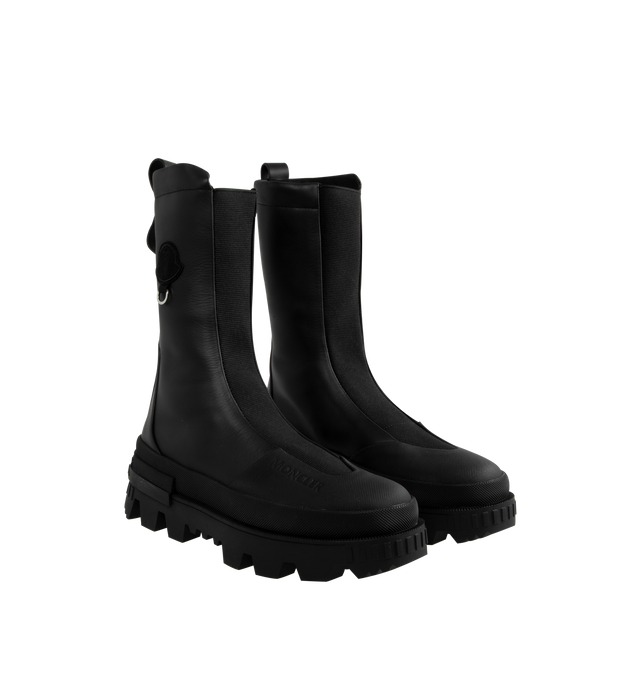 Image 2 of 4 - BLACK - Moncler Genius X Willow Smith Salix Boots are a slip-on style with elastic inserts, leather and rubberized leather uppers, mesh insoles, and rubber lug soles with PU inserts.  