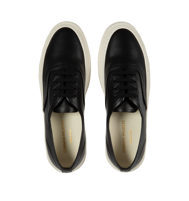 Image 5 of 5 - BLACK - Common Projects Four Hole Lace-Up Sneakers in a low-top design with flat sole, front lace-up fastening, round toe detailed with signature gold number stamp at the heel. Made in Italy. 