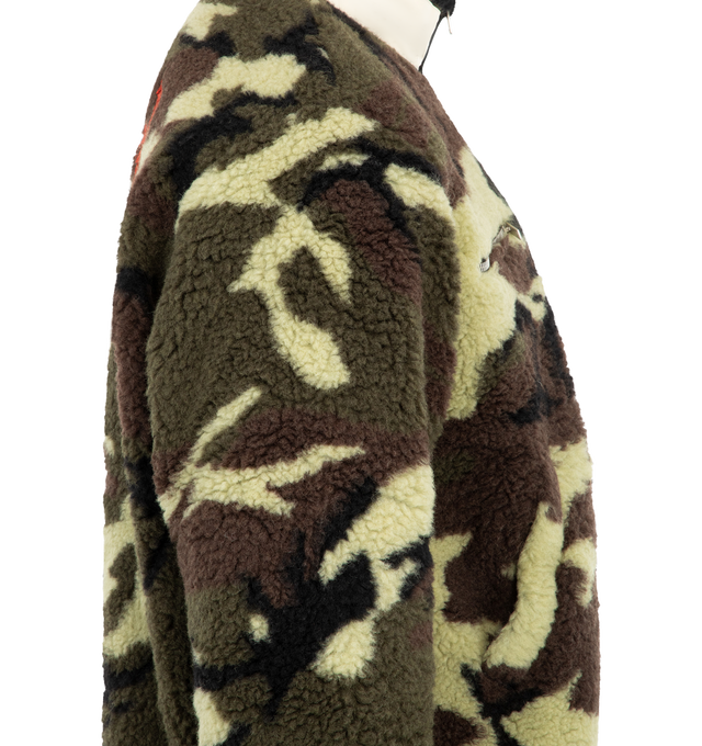 Image 3 of 3 - GREEN - Rhude Men's Parilla Camouflage Wool-Blend Fleece Jacket is crafted from camouflage-patterned wool-blend fleece and features a stand collar with a zip-front silhouette. Designed with a logo motif at the front and back, a chest zip pocket, welt pockets, elasticized cuffs, and an adjustable drawstring hem for a functional yet elevated finish. Main Material: 74% Wool, 26% Polyester. Lining: 100% Polyester. 