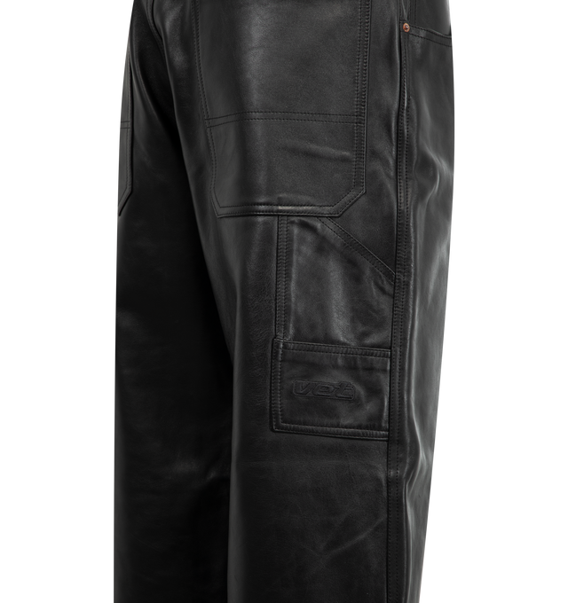 Image 4 of 4 - BLACK - VETEMENTS Hip-Hop Jeans featuring non-stretch denim jeans, belt loops, five-pocket styling, zip fly, patch pockets and logo patch at outseam and hammer loop at outseam. Leather. Made in Italy. 