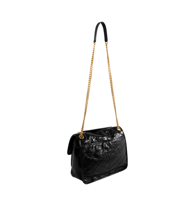 Image 3 of 4 - BLACK - NIKI Medium Bag in vintage leather featuring chevron-quilted topstitching, sliding leather-and-chain strap allows for both shoulder and crossbody carry, chrome-free, metal-free tanned leather, certified cotton lining, bronze-tone hardware, magnetic snap closure, one back pocket and one open pocket under flap. 11" x 7.9" x 3.3". Calfskin leather. Made in Italy. 