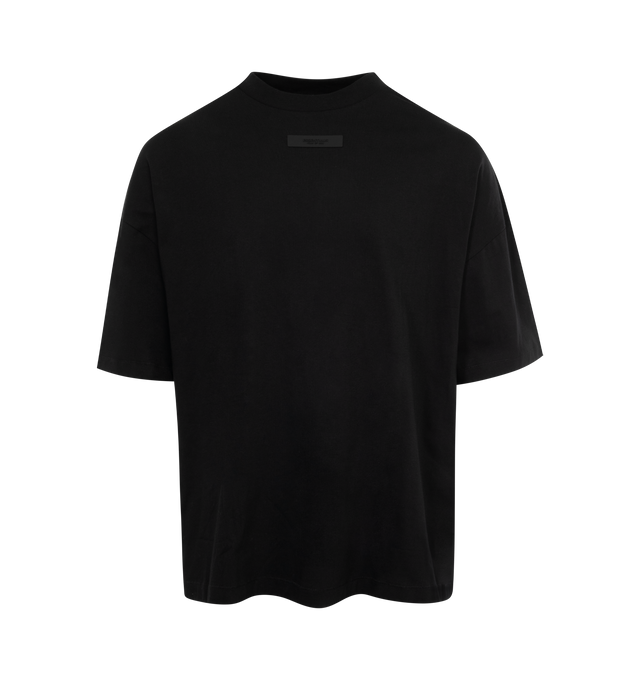 BLACK - FEAR OF GOD ESSENTIALS Crewneck T-Shirt featuring rib knit crewneck, rubberized logo patch at chest and back, dropped shoulders and dolman sleeves. 100% cotton. Made in Viet Nam.