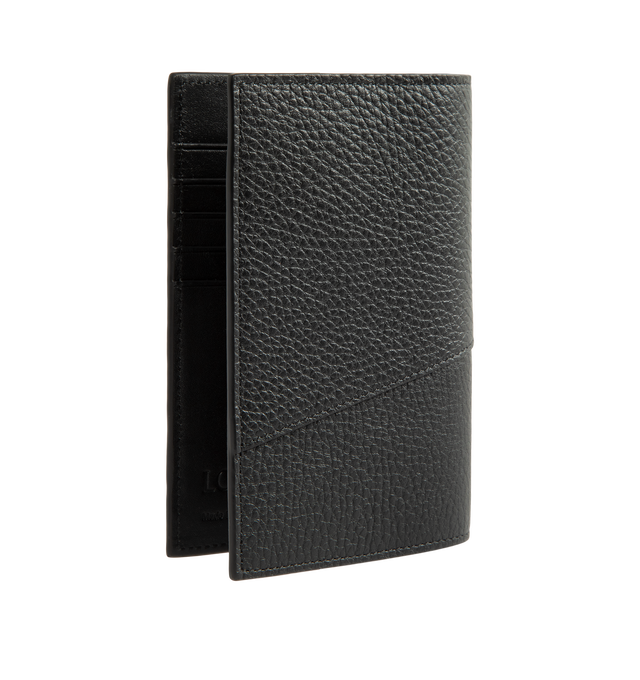 Image 2 of 3 - BLACK - Loewe Puzzle Passport Cover is crafted from supple grained calfskin leather and features the distinctive geometric pattern inspired by the iconic Puzzle bag. Designed to keep travel essentials organized, this passport holder is finished with five card slots, two interior flap pockets, an additional slip pocket, a calfskin lining, and an embossed Anagram logo. Main Material: Supple Grained Calfskin Leather. Lining: Calfskin Leather. Dimensions: 14 x 9.3 x 1.2 cm / 5.5 x 3.7 x 0.5 in. C 