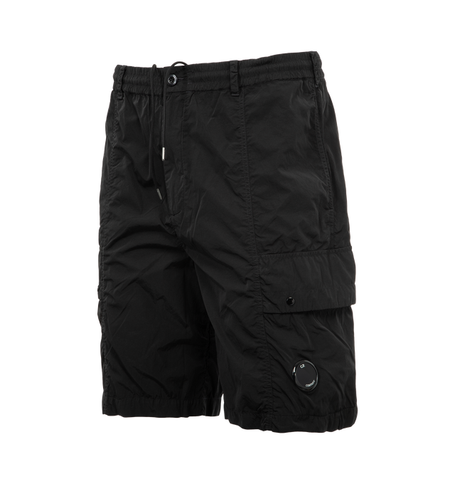 Image 3 of 3 - BLACK - C.P. COMPANY Chrome-R Lens Boxy Cargo Shorts featuring adjustable drawstring waistband, button and zip fastening, belt loops, side pockets, cargo flap snap pockets with Lens detail, back snap pocket, back applied logo label, garment dyed and boxy fit. 100% polyamide/nylon. 