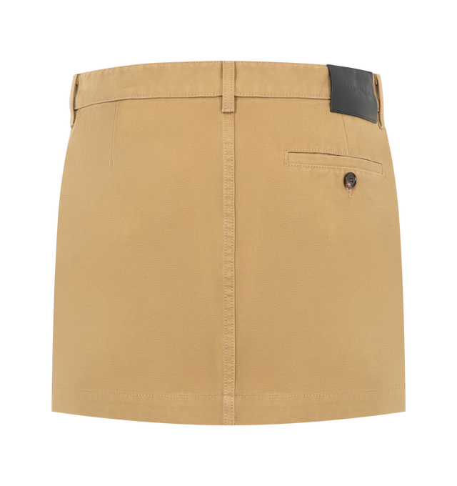 Image 2 of 3 - NEUTRAL - Balenciaga Womens Mini Cotton Skirt is crafted from heavy cotton. Feature a mid-rise waist, covered zip fly, belt loops, front slash pockets, back buttoned welt pocket, and a Balenciaga logo leather patch at the back. Main Material: 100% Cotton; Pocket Lining: 100% Cotton; Trim: Cow Leather. Made in Italy. 