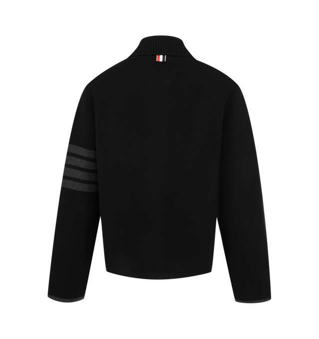 Image 2 of 3 - BLACK - Thom Browne Womens Double-Face Piqu Stitch Polo Collar Jacket is crafted from a virgin wool and cotton blend double-face piqu knit and features a rib-knit polo collar, front button closure, raglan sleeves, rib-knit patch pockets with contrast tipping, rib-knit cuffs and hem, signature 4-bar detailing, internal RWB grosgrain trim, and the signature striped grosgrain loop tab. Main Material: 50% Virgin Wool, 47% Cotton, 3% Polyamide. Made in Italy. 