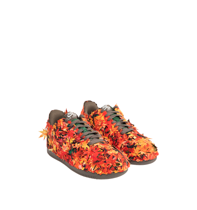 Image 4 of 6 - MULTI - NIKE Air Force 1 '07 Sneaker featuring leaves applied as an outer layer that is intended to be tearaway in certain places over time, slowly uncovering the golden-brown hairy suede base color underneath in the design that suggests fallen leaves on the forest floor being absorbed back into the soil. 