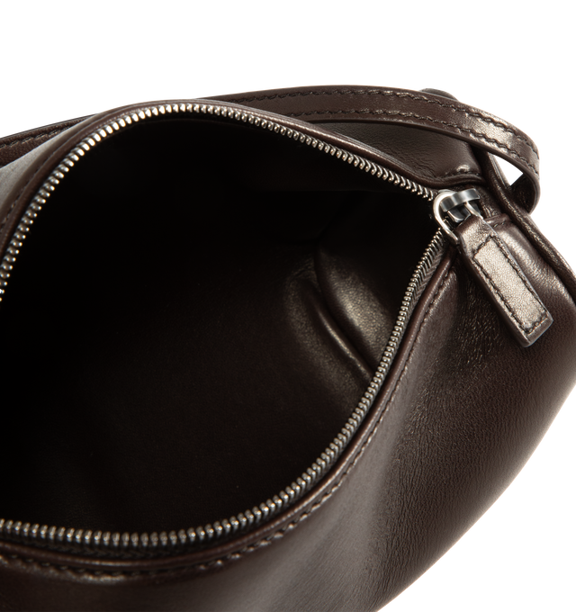 Image 3 of 3 - BROWN - THE ROW 90's Bag featuring top handle bag in finely grained calfskin leather with softly rounded edges, leather piping and adjustable slim leather strap. 7.7 x 4.5 x 3 in. 100% calfskin leather. Made in Italy. 