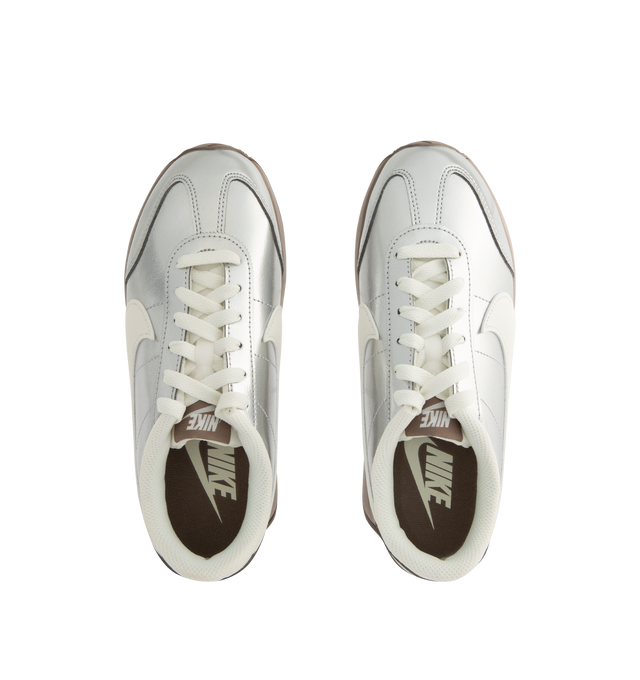 Image 5 of 5 - SILVER - NIKE Pacific Sneaker featuring synthetic leather upper with a metallic finish, wide collar opening, herringbone gum sole with flex grooves, puffed Swoosh logo and foam midsole. 
