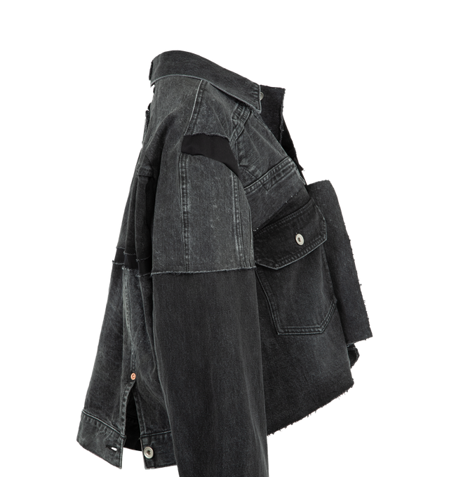 Image 3 of 4 - BLACK - SACAI Denim Jacket featuring fading throughout, spread collar, button closure Flap pocket at front, buttoned barrel cuffs, patchwork throughout and asymetrical hem. 100% cotton. Made in Japan. 