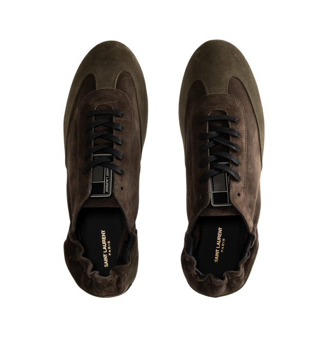 Image 5 of 5 - BROWN - Saint Laurent Men's 'Lewis 05' sneakers are cut from tonal panels of suede and velvet. Elasticated trims allow for easy entry, while a logo-embossed patch at the heel offers a signature house finish. Material: leather (suede); Lining: leather; Sole: leather insole, rubber sole; Toe shape: round toe. Made in Italy 