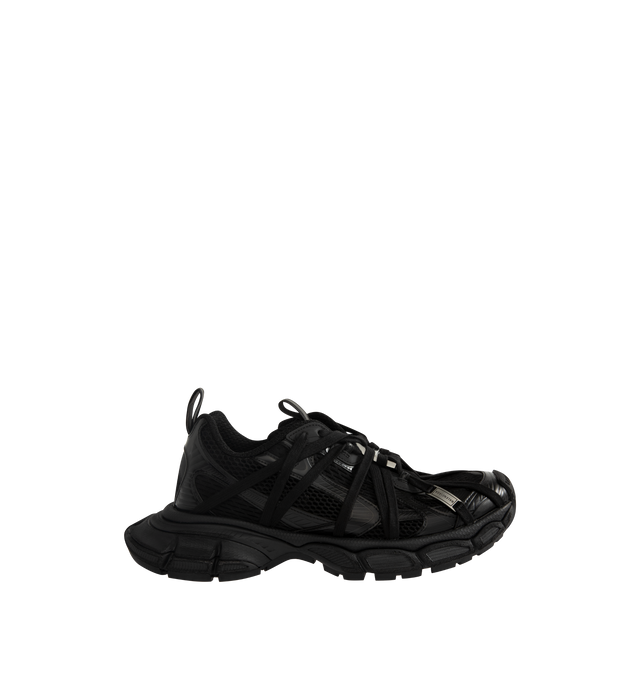 Image 1 of 5 - BLACK - BALENCIAGA 3XL Extreme Laces B Sneaker featuring leather free, slip-on sneaker, polyurethane and polyester, worn-out effect, multiple lace details all around the upper, metallic plate with logo engraved, aged-silver B logo hardware on the upper, Balenciaga logo at the edge of the toe and at back, debossed size on the upper and at the back of the heel, 3XL rubber branding on the tongue with reflective detail and back and tongue pull-on tab with reflective detail. Upper: polyurethane, p 