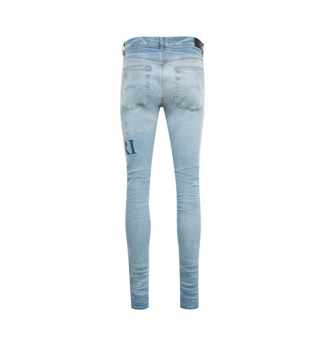 Image 2 of 3 - BLUE - Amiri Starburst Applique Skinny Jeans are a 5-pocket style with a button and zip fly, distressing, signatStarburst Applique Skinny Jeans (Mens) ure brand logo appliques on the left leg, and a regular rise. Cotton, polyester, elastane. Made in USA.  