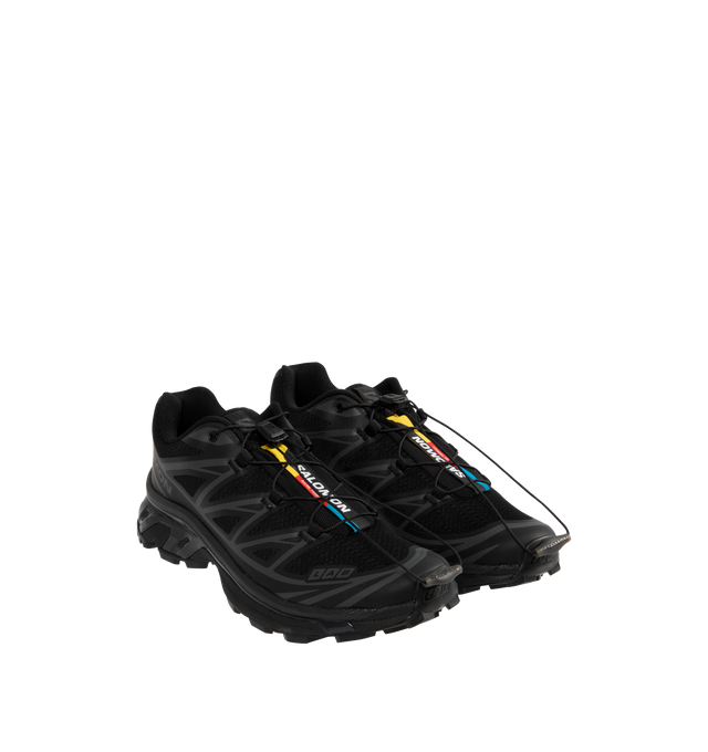 Image 2 of 5 - BLACK - Salomon XT-6 Sneakers are a lace-up style with an Agile Chassis System, abrasion-resistant TPU materials, single-layer mesh, SensiFit systems, protective toecaps, lace pockets for the Quicklace lacing system, molded OrthoLite sock liners, and rubber outsoles.  