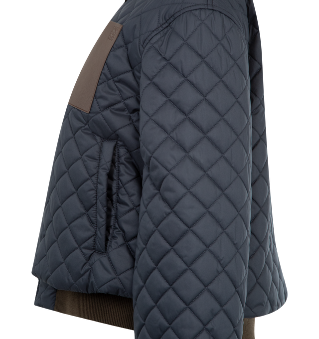 Image 3 of 3 - NAVY - LOEWE Short Jacket in lightweight technical fabric featuring allover diamond quilting, regular fit, short length, corduroy collar and inside cuff, zip front fastening and snap button cuffs, vertical welt pockets, inside welt pocket, contrast rib knit hem and anagram embossed leather patch pocket placed on the chest. Polyester. Made in Italy. 