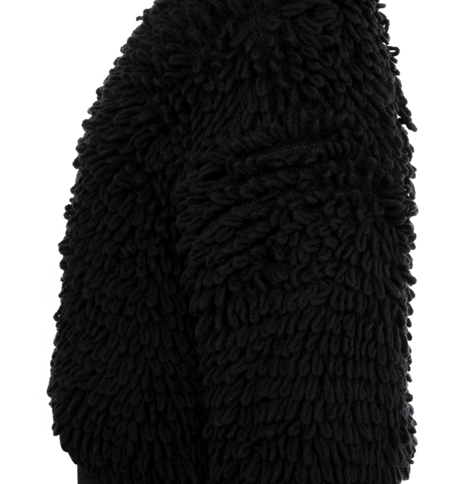 Image 3 of 3 - BLACK - Moncler x EE72 by Edward Enninful Wool Blend Zip-Up Cardigan featuring a wool blend, nylon laqu lining, down-filled, gauge 3, ribbed stand collar, zipper closure, pockets with snap button closure and logo patch. 92% virgin wool, 8% acrylic. Lining: 100% polyamide/nylon. Padding 90% down, 10% feather. Made in Moldova. 