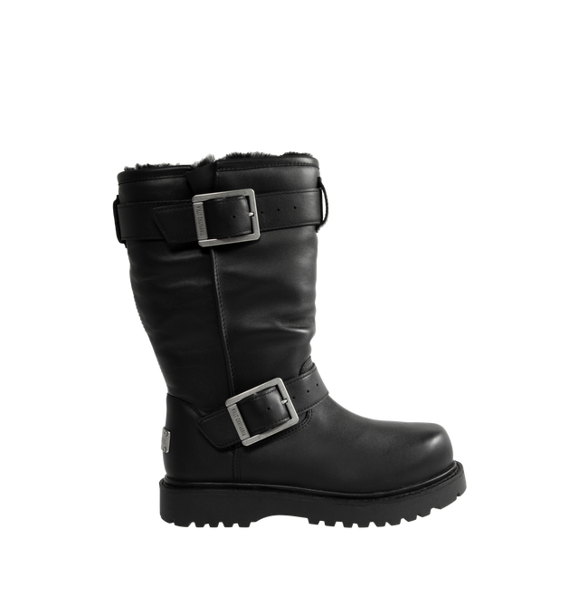 Image 1 of 4 - BLACK - UGG x Willy Chavarria Biker Boot is crafted from leather and reimagines UGG's iconic silhouette with a rugged, moto-inspired design. Featuring a mid-calf profile, chrome hardware detailing, and UGG's signature plush sheepskin lining, the boot combines bold utility styling with exceptional comfort. Main Material: Leather. Lining: Sheepskin. Unisex style in men's sizes. 