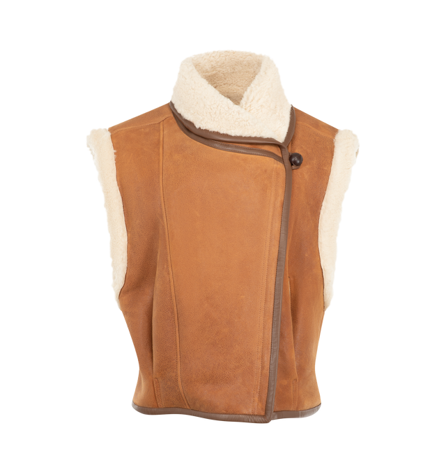 Image 1 of 3 - BROWN - Isabel Marant Womens Shearling Vest is crafted from genuine lamb fur and lamb leather. Features a stand collar, asymmetric button-front closure, sleeveless silhouette, contrast leather trim, and a cropped fit. Main Material: 100% Lamb Fur & Lamb Leather. Made in Turkey. 