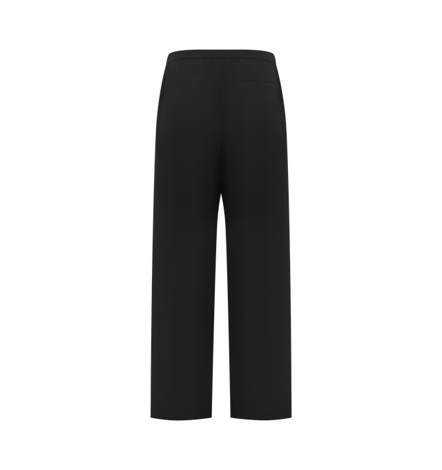 Image 2 of 3 - BLACK - Jil Sander Mens Trousers are crafted from lightweight technical fabric. Feature an elasticized waistband, side zip pockets, and a wide-leg silhouette. Main Material: 100% Polyester. Made in Italy. 