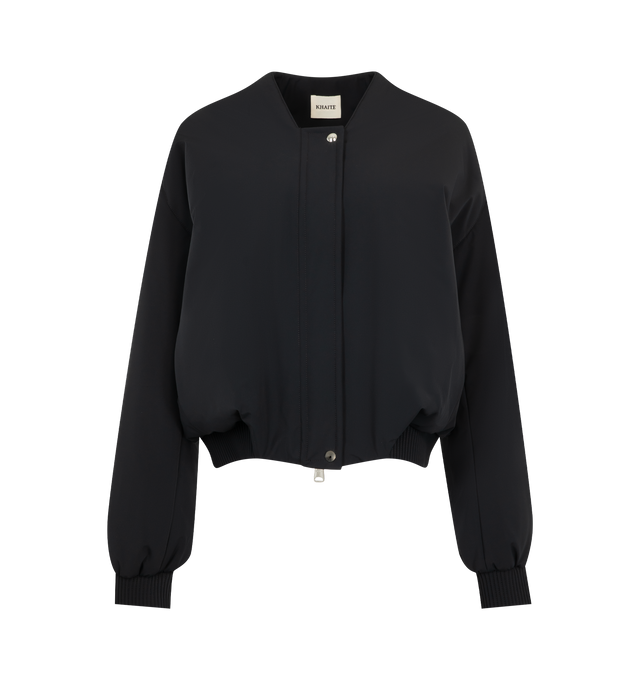 Image 1 of 4 - BLACK - Khaite Womens Cropped Bomber Jacket is crafted from double-face technical nylon. Features a cropped silhouette, front zip closure, rounded shape, signature armhole seaming, topstitched detailing, elasticized cuffs and hem, and in-seam side pockets. Main Material: 57% Nylon, 27% Polyurethane, 16% Elastane. Made in Italy. 