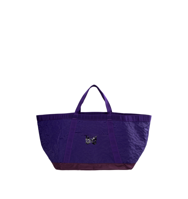 Image 1 of 3 - PURPLE - Needles Large Tool Tote is crafted from nylon and features a diamond-quilted construction, a Papillon print at the front, two top handles, grosgrain trim, a front slip pocket, and a zip-fastening back pocket. Designed as a spacious everyday carryall, this oversized tote offers ample room for work, travel, or daily essentials. Main Material: 100% Nylon. Dimensions: 76 x 32 x 33 cm / 29.9 x 12.6 x 13.0 in. Pockets: Front Open Pocket, Front Slip Pocket, Back Zip Pocket. Fits a 16" lapt 
