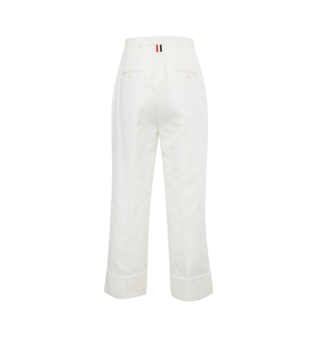 Image 2 of 3 - WHITE - THOM BROWNE tailored trouser with a shortened hem, tab front closure, slip side pockets, button-fastening back welt pockets, and signature striped grosgrain loop tab. 100% Cotton. 