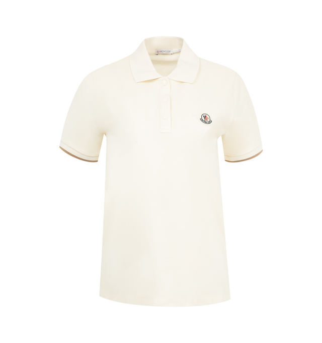 Image 1 of 2 - WHITE - MONCLER Polo shirt has a spread collar, snap button placket, embroidered logo at chest and contrast stripe trim. 100% cotton.  