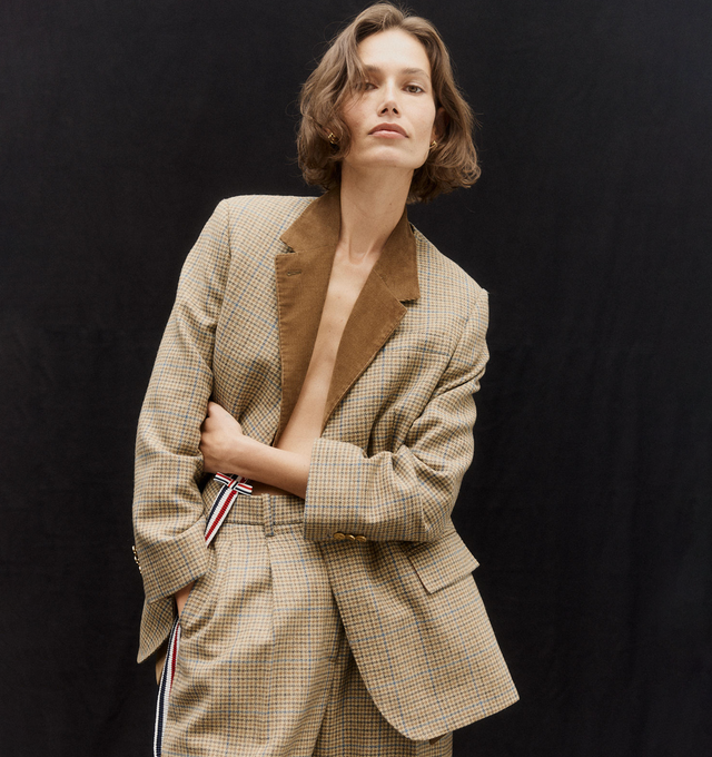 Image 2 of 5 - BROWN - THOM BROWNE Check Cheviot Tweed Sportcoat featuring narrow shoulders, double-layered construction, front button closure with striped grosgrain bow, 4-bar detailing, 2 front flap pockets, single chest pocket, buttoned cuffs with signature striped grosgrain trim, interior pocket with name tag, removable sleeves, reversible and signature striped grosgrain loop tab. 100% wool. 100% cotton. Lining: 100% cupro. Made in Italy. 