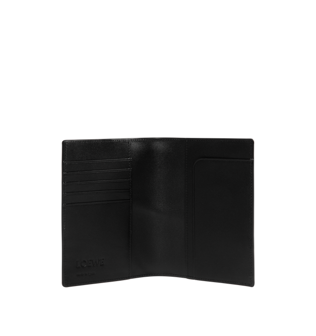 Image 3 of 3 - BLACK - LOEWE Puzzle Passport Cover in supple grained calfskin featuring passport cover inspired by the Puzzle bag's distinctive geometric pattern, five card slots, two pockets in flap, one additional pocket, calfskin lining and embossed Anagram. Supple grained calf. 14 cm x 9.3 cm x 1.2 cm. Made in Spain. 