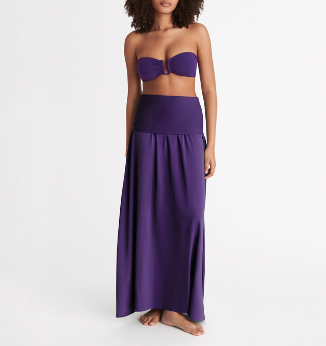 Image 2 of 4 - PURPLE - ERES Oda Long Dress featuring long bustier dress with a raw edge finishing at the top and bottom that gives you the styling option to wear it as a long skirt. Main: 94% Polyamid, 6% Spandex. Second: 84% Polyamid, 16% Spandex. Made in France. 