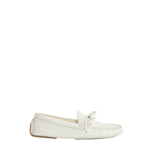 WHITE - THE ROW Lucca Moccasin featuring grained vegetable-tanned leather with flexible hand-stitched construction and lace-up detail. 100% leather. Made in Italy.