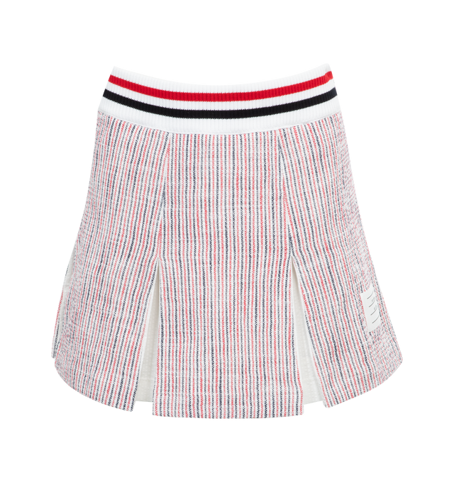 Image 1 of 2 - RED - THOM BROWNE Mini Box Pleat Skirt featuring stripes and inverted box pleats throughout, stripes at rib knit elasticized waistband, logo patch at front, concealed zip closure at side seam, tricolor grosgrain flag at back waist and full seersucker lining. 91% cotton, 8% polyamide, 1% elastane. Trim: 90% cotton, 9% polyamide, 1% polyurethane. Lining: 100% cotton. Made in Italy. 
