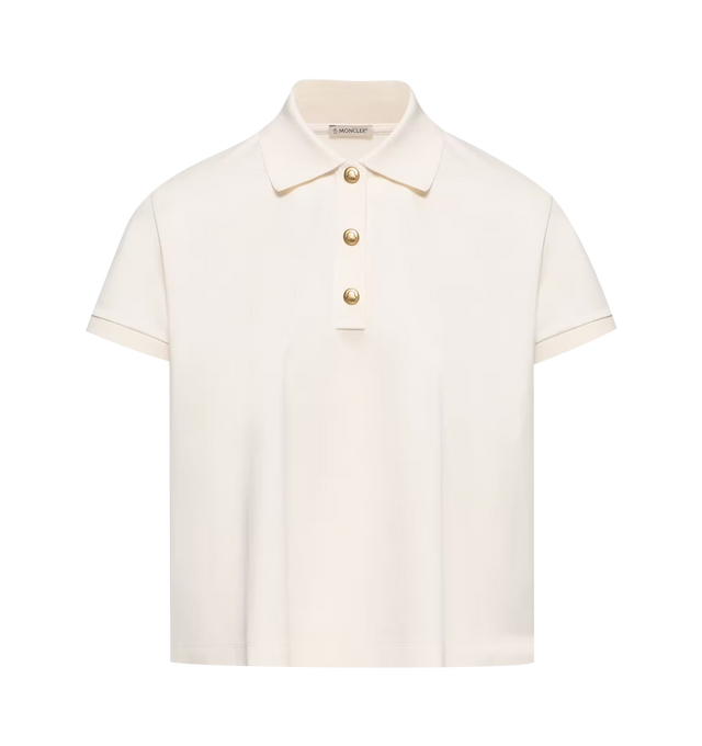 Image 1 of 1 - NEUTRAL - Moncler Women's Polo Shirt featuring cotton material, collar, short sleeves, snap button closure, striped cuffs and logo patch. 100% cotton. 