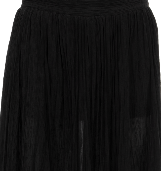Image 3 of 3 - BLACK - TOTEME Crinkled Pliss Skirt featuring a semi-sheer, crinkled fabric, made from a fine organic-cotton blend that is partially lined with an inner skirt and fastened with a concealed zipper. 72% organic cotton, 28% polyamide. 