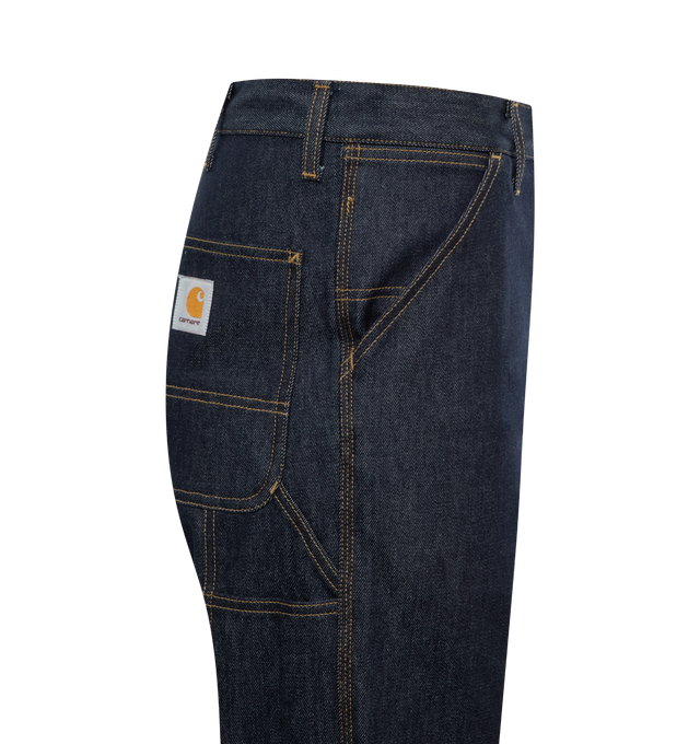 Image 3 of 3 - BLUE - CARHARTT WIP Single Knee Jeans featuring relaxed-fit, straight-leg, belt loops, five-pocket styling, zip-fly, utility pocket at outseams, logo patch at back pocket and contrast stitching in tan. 100% cotton. 