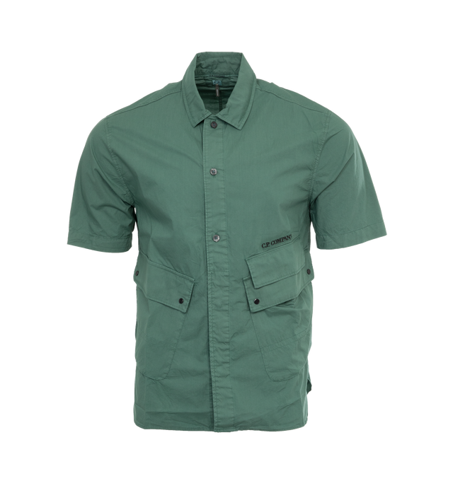 Image 1 of 3 - GREEN - C.P. COMPANY Popeline Pocket Shirt featuring classic collar, front button fastening, short sleeves, front flap pockets, military-inspired design and regular fit. 100% cotton. 