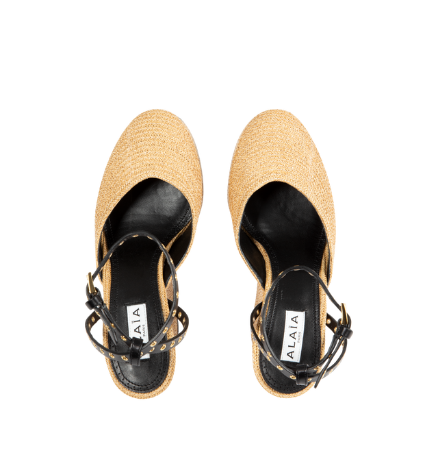 Image 4 of 4 - NEUTRAL - ALAIA Wedge Sandals featuring leather eyelet-detailed straps, chunky platform sole and buckle fastening. Heel height measures 150mm. Platform measures 75mm. Raffia, leather. 