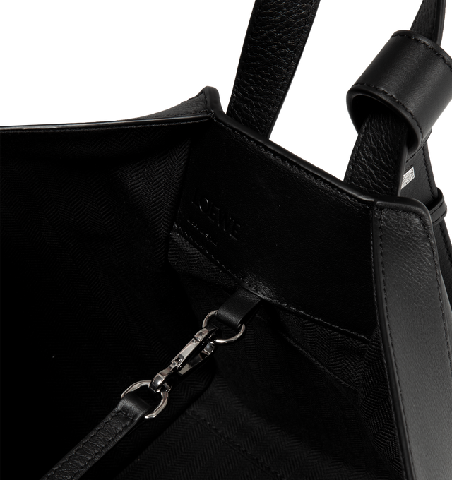 Image 5 of 6 - BLACK - LOEWE Hammock Compact Bag featuring shoulder, crossbody or top handle carry, detachable and adjustable strap, internal hook closure, external zip pocket, two internal slip pockets and embossed Anagram. 8.2 x 5.7 x 7.7 inches. Classic calf. 