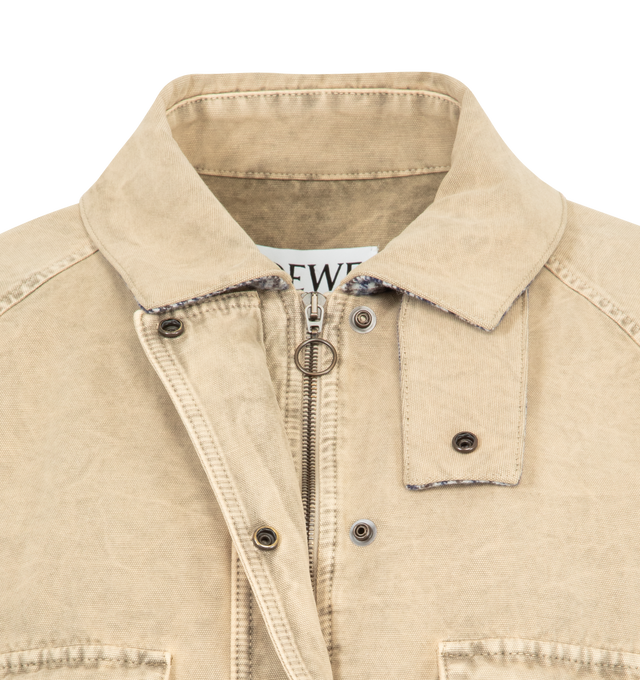 Image 4 of 4 - NEUTRAL - Loewe Jacket in lightweight treated cotton utility featuring diamond quilted lining at the hem. Regular fit, short length with lassic collar with check wool lining and chin strap, raglan sleeves, concealed snap button and zip front fastening, snap button flap pockets, inside welt pocket and LOEWE Anagram embossed leather patch placed at the back. Made in Italy. 