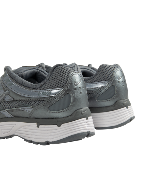 Image 3 of 5 - GREY - Nike P-6000 Sneaker featuring breathable mesh has real and synthetic leather overlays, foam midsole provides lightweight cushioning for a plush underfoot feel, no-slip grip and full rubber outsole. 