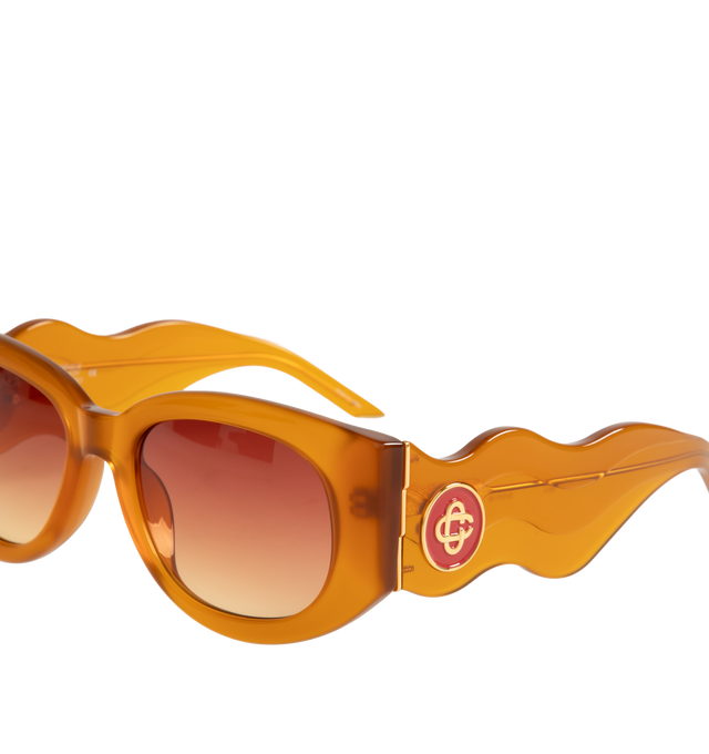 Image 3 of 3 - ORANGE - CASABLANCA Wavy Acetate Sunglasses featuring 100% UV protection, branding at sides, wavy temple design and tinted lenses. 100% acetate. 