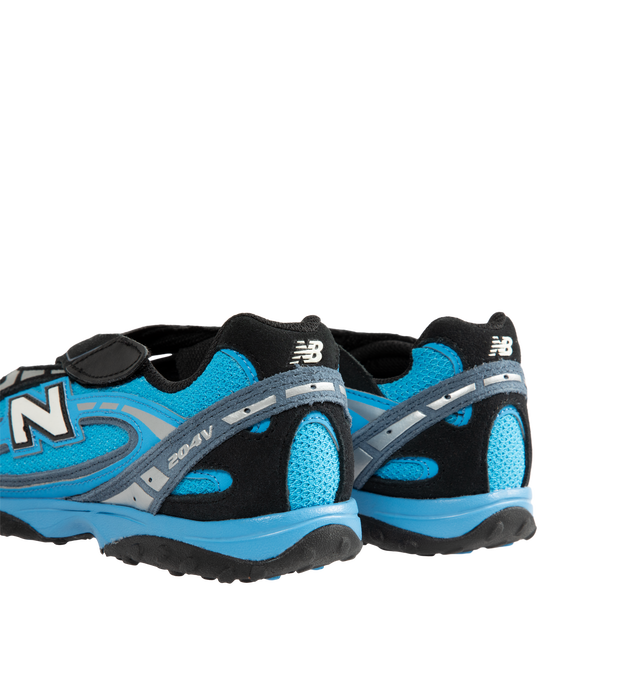 Image 3 of 5 - RED - New Balance Unisex 204V Sneakers feature a low-profile silhouette in Neo Flame, Black, and Black Cement, combining premium suede and textile materials in a multi-piece upper with embossed overlays. Screen-printed graphics along the saddle and a molded "N" logo complete the design, while an alternative strap closure provides easy access and an adjustable fit. Upper: Suede and Textile. Midsole: EVA. Closure: Adjustable Strap. *Unisex style in men's sizing. 