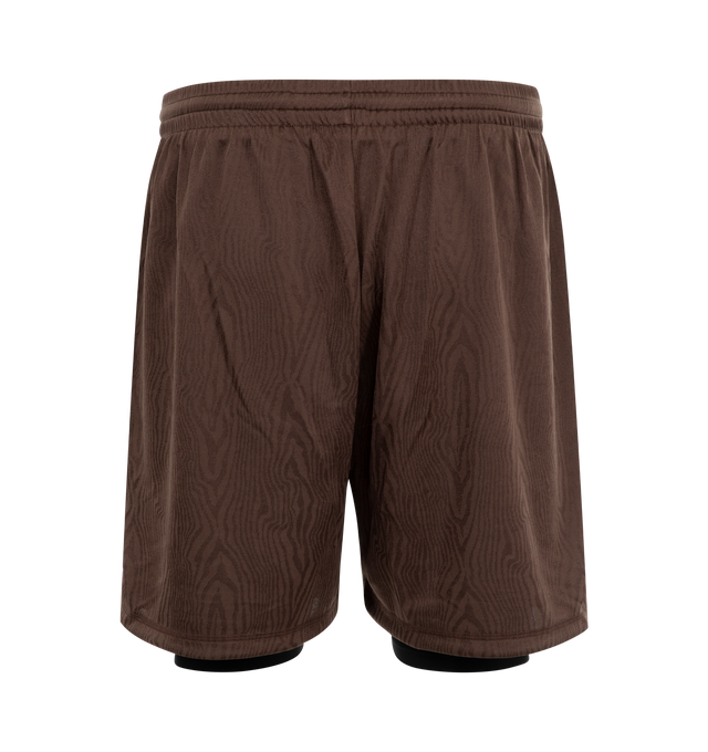 Image 2 of 4 - BROWN - Martine Rose football shorts crafted from dryfit jersey featuring vinyl Martine Rose crest and logo, elasticated waist, built-in elasticated tights designed to show just below the hem. Unisex style in men's sizing. 100% polyester with 59% polyamide / 41% elastane lining. 