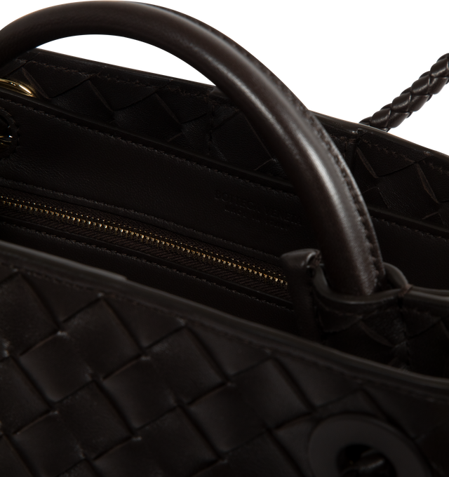 Image 4 of 4 - BLACK - BOTTEGA VENETA Small Andiamo handbag featuring intrecciato leather with leather top handle, sliding cross-body strap, compartmented interior with one zippered pocket, two open pockets and magnetic closure. 7.9" x 9.8" x 3.9". 100% lambskin. Made in Italy. 