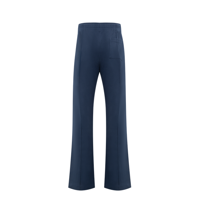 Image 2 of 3 - BLUE - CASABLANCA Loopback Patch Open Hem Jogger featuring a flared leg, open hem, signature CC patch, elasticated drawstring waistband, center seams, 2 side pockets and woven brand patch. 100% organic cotton. Made in Portugal. 