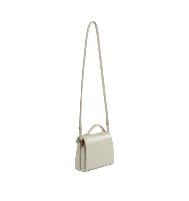 Image 2 of 3 - WHITE - SAINT LAURENT CASSANDRA MINI TOP HANDLE BOX BAG with front flap and pivoting metal Cassandre closure, featuring leather top handle, adjustable and detachable shoulder strap, bronze tone metal hardware,  leather lining, 2 interior compartments, one interior flat pocket, one exterior dossier pocket, four metal feet. Measures  7.8 X 6.2 X 2.9 inches with 20 inch drop shoulder strap. Calfskin leather. Made in Italy. 